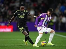 Ivan Fresneda of Real Valladolid CF is challenged by Vinicius Junior of Real Madrid during the LaLiga Santander match between Real Valladolid CF and Real Madrid CF at Estadio Municipal Jose Zorrilla on December 30, 2022 in Valladolid, Spain. (Photo by Angel Martinez/Getty Images)