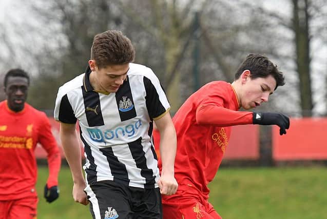 Lewis McNall challenges Jordan Hunter, now of South Shields, when they played for Newcastle United and Liverpool.