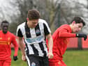 Lewis McNall challenges Jordan Hunter, now of South Shields, when they played for Newcastle United and Liverpool.