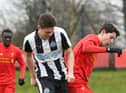 Lewis McNall challenges Jordan Hunter, now of South Shields, when they played for Newcastle United and Liverpool.
