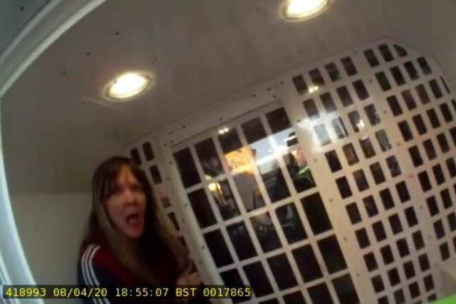 Charlene Merrifield can be seen coughing at the officer in footage released by Northumbria Police.