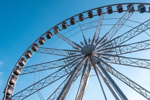 Stock image of a Ferris wheel c/o JancickaL/Pixabay