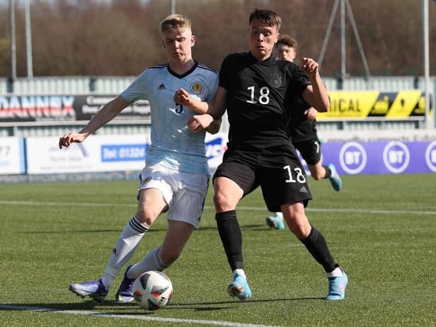 Charlie McArthur of Scotland vies with Dzenan Pecinovic of Germany during the UEFA Under17 European Championship Qualifier match between Germany U17 and Scotland U17 on March 26, 2022 in Glasgow, Scotland. (Photo by Ian MacNicol/Getty Images)