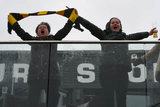 Fans at Hebburn Sports Club react on the final whistle, as the Hornets seal FA Vase victory
