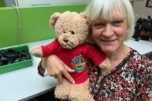 Carolyn with a Harton Primary School teddy bear
