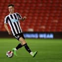 Joe White of Newcastle United U21 on the ball during the Papa John's Trophy match between Barnsley and Newcastle United U21 at Oakwell Stadium on September 20, 2022 in Barnsley, England. (Photo by George Wood/Getty Images)