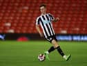 Joe White of Newcastle United U21 on the ball during the Papa John's Trophy match between Barnsley and Newcastle United U21 at Oakwell Stadium on September 20, 2022 in Barnsley, England. (Photo by George Wood/Getty Images)