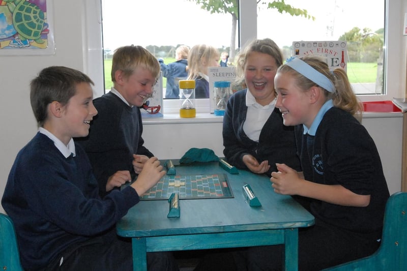 All smiles during a board game session at playtime.