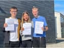 Louis Summerly celebrates his top results with fellow St Joseph's Catholic Academy A Level students, Josh Mitchell and Megan Shiell.