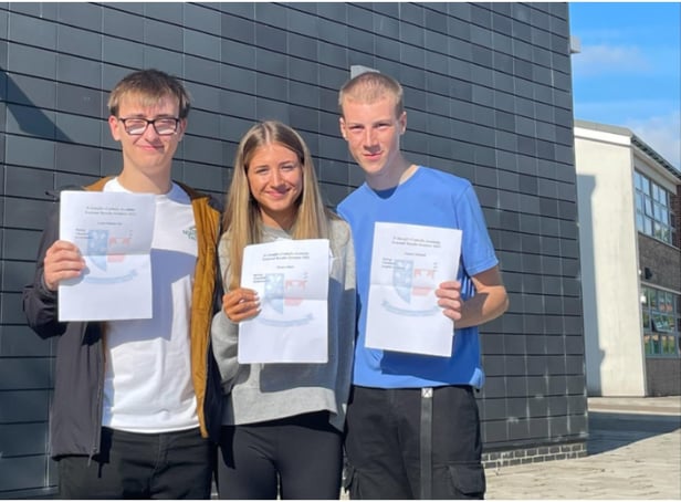 Louis Summerly celebrates his top results with fellow St Joseph's Catholic Academy A Level students, Josh Mitchell and Megan Shiell.