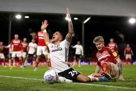 LONDON, ENGLAND - JANUARY 17: Anthony Knockaert of Fulham is fouled by Hayden Coulson of Middlesbrough FC during the Sky Bet Championship match between Fulham and Middlesbrough at Craven Cottage on January 17, 2020 in London, England. (Photo by James Chance/Getty Images)