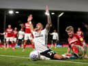 LONDON, ENGLAND - JANUARY 17: Anthony Knockaert of Fulham is fouled by Hayden Coulson of Middlesbrough FC during the Sky Bet Championship match between Fulham and Middlesbrough at Craven Cottage on January 17, 2020 in London, England. (Photo by James Chance/Getty Images)