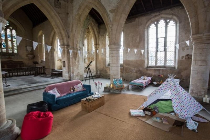 Snuggle down inside the original Champing church - All Saints in Aldwincle, a beautiful, ancient space in Northamptonshire.
