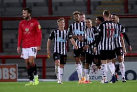 MORECAMBE, ENGLAND - SEPTEMBER 23: Joelinton of Newcastle United (third left) celebrates after scoring his sides fourth goal with teammates during the Carabao Cup third round match between Morecambe and Newcastle United at Globe Arena on September 23, 2020 in Morecambe, England.