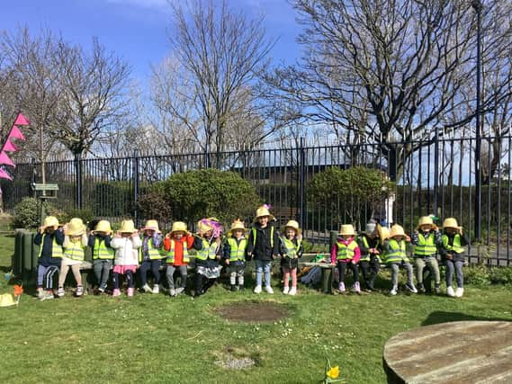 Nursery children celebrate Easter.