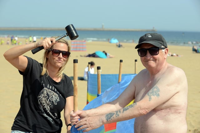 High temperatures at Sandhaven Beach. Karen Pearce and Dave Penman.