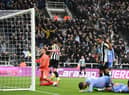 Callum Wilson of Newcastle United celebrates after Adam Smith of AFC Bournemouth scores an own goal during the Carabao Cup Fourth Round match between Newcastle United and AFC Bournemouth at St James' Park on December 20, 2022 in Newcastle upon Tyne, England. (Photo by Stu Forster/Getty Images)