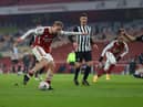 Emile Smith Rowe of Arsenal scores their team's first goal during the FA Cup Third Round match between Arsenal and Newcastle United. (Photo by Julian Finney/Getty Images)