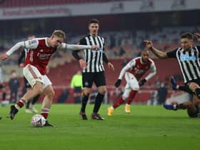 Emile Smith Rowe of Arsenal scores their team's first goal during the FA Cup Third Round match between Arsenal and Newcastle United. (Photo by Julian Finney/Getty Images)