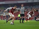 Emile Smith Rowe of Arsenal scores their team's first goal during the FA Cup Third Round match between Arsenal and Newcastle United. (Photo by Julian Finney/Getty Images)