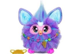 Furby Purple Interactive Toy, currently priced at £54.99.