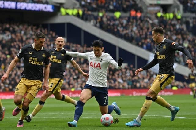 How has Newcastle United's defeat to Tottenham Hotspur impacted their survival hopes? (Photo by GLYN KIRK/AFP via Getty Images)