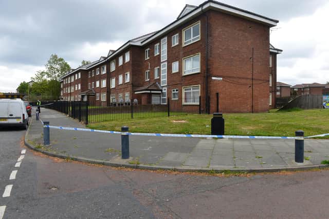 A large cordon was thrown around the flats in Victoria Road, South Shields, as a murder inquiry began.