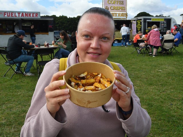 Dawn Hails tries some loaded fries.