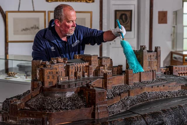 Andrew Heeley, caretaker at Bamburgh Castle, prepares it for reopening. Picture: Charlotte Graham