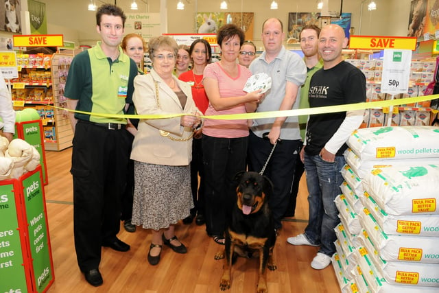 The Mayor Coun Eileen Leask opens the new Pets at Home store in 2012, with staff and competition winners, Marron and Darren Bassett with dog Alfred all in the picture.