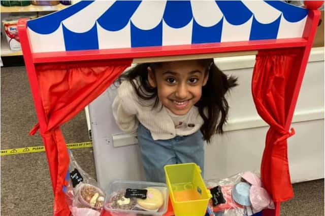 Anjali sold cakes at her family's post office to raise money for WaterAid.