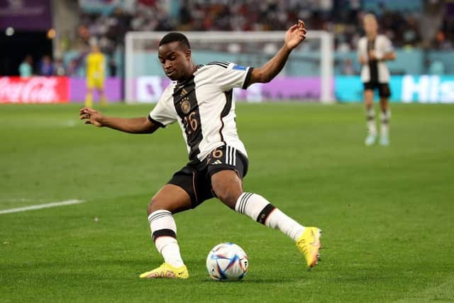 Youssoufa Mokouko of Germany runs with the ball during the FIFA World Cup Qatar 2022 Group E match between Germany and Japan at Khalifa International Stadium on November 23, 2022 in Doha, Qatar. (Photo by Alexander Hassenstein/Getty Images)