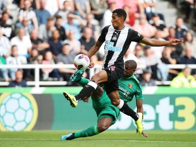 Newcastle United's Isaac Hayden clashes with Watford's Christian Kabasele (Photo by Ian MacNicol/Getty Images)