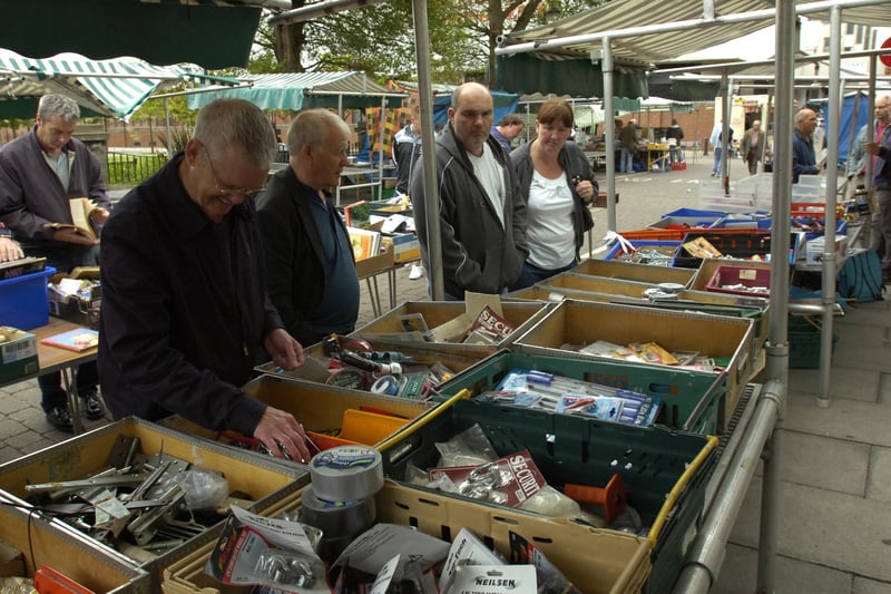 Customers pictured at the market in July 2009.