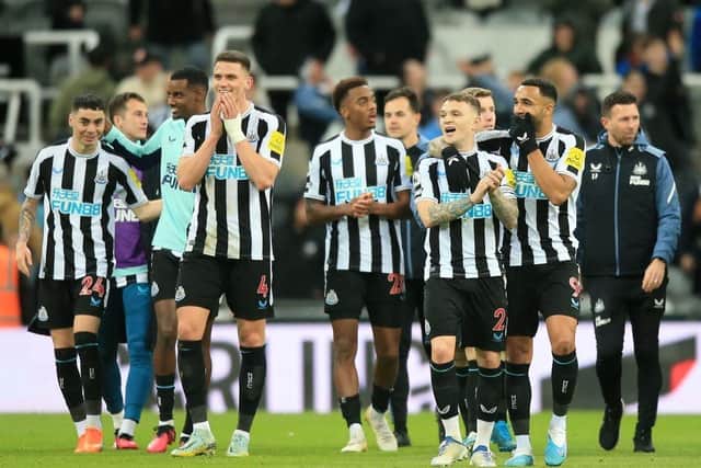 Match-winner Miguel Almiron, far left, celebrates with his Newcastle United team-mates.