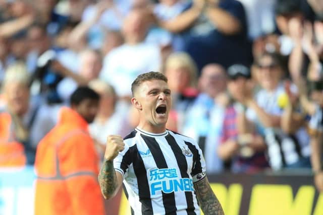 Newcastle United's English defender Kieran Trippier celebrates after scoring his team third goal during the English Premier League football match between Newcastle United and Manchester City at St James' Park in Newcastle-upon-Tyne, north east England, on August 21, 2022. (Photo by LINDSEY PARNABY/AFP via Getty Images)