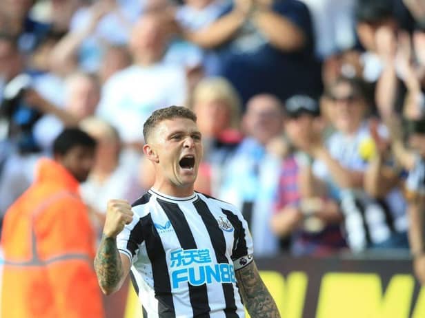Newcastle United's English defender Kieran Trippier celebrates after scoring his team third goal during the English Premier League football match between Newcastle United and Manchester City at St James' Park in Newcastle-upon-Tyne, north east England, on August 21, 2022. (Photo by LINDSEY PARNABY/AFP via Getty Images)