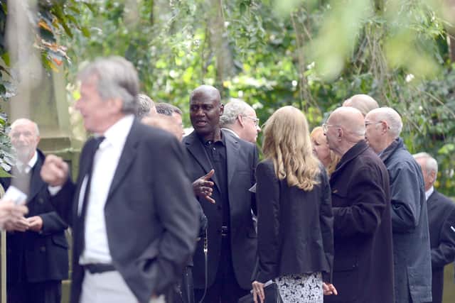 Gary Bennett chats to mourners