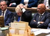 Boris Johnson flanked by Justice Secretary and deputy Prime Minister Dominic Raab, left, and new Chancellor of the Exchequer Nadhim Zahawi during prime minister's questions in the House of Commons on July 6. Photo by Jessica Taylor / UK Parliament / AFP via Getty Images