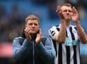 Newcastle United head coach Eddie Howe and defender Dan Burn after the Manchester City defeat.