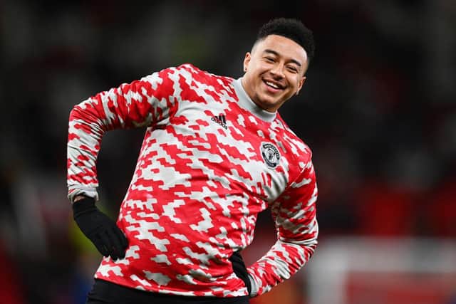 Jesse Lingard of Manchester United reacts as he warms up prior to the Premier League match between Manchester United and Burnley at Old Trafford on December 30, 2021 in Manchester, England. (Photo by Dan Mullan/Getty Images)