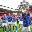 Jamie Sterry lifting the National League promotion final trophy (photo: PA)