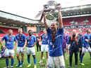 Jamie Sterry lifting the National League promotion final trophy (photo: PA)
