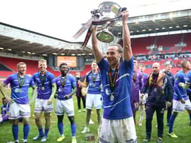Jamie Sterry lifting the National League promotion final trophy (photo: PA)