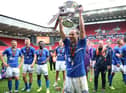 Jamie Sterry lifting the National League promotion final trophy (photo: PA)