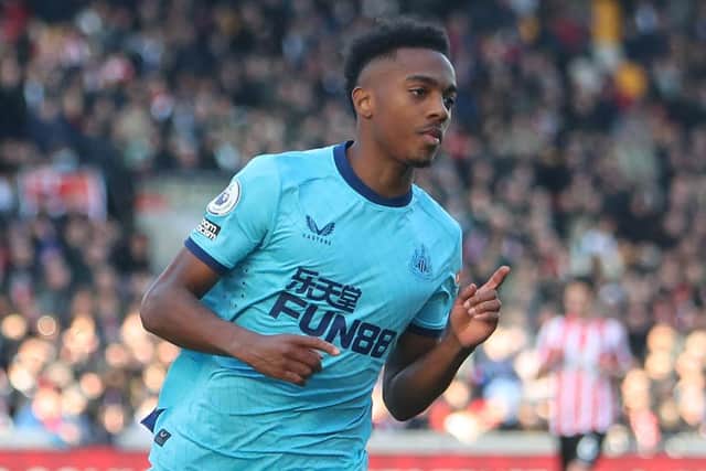 Newcastle United's English midfielder Joe Willock celebrates after scoring their second goal during the English Premier League football match between Brentford and Newcastle United at Brentford Community Stadium in London on February 26, 2022.  (Photo by GEOFF CADDICK/AFP via Getty Images)