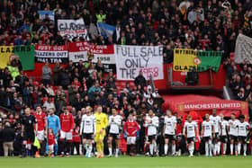 A general view as players of Manchester United and Fulham walk out of the tunnel. (Photo by Clive Brunskill/Getty Images).
