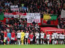 A general view as players of Manchester United and Fulham walk out of the tunnel. (Photo by Clive Brunskill/Getty Images).