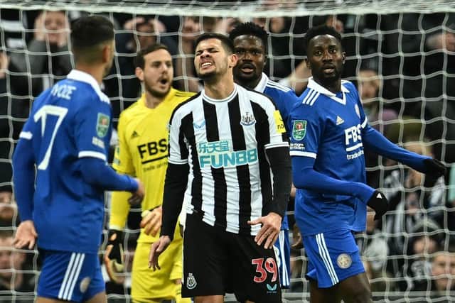 Newcastle United's Brazilian midfielder Bruno Guimaraes (C) reacts after missing a chance during the English League Cup quarter final football match between Newcastle United and Leicester City at St James' Park in Newcastle upon Tyne in north-east England on January 10, 2023. (Photo by PAUL ELLIS/AFP via Getty Images)