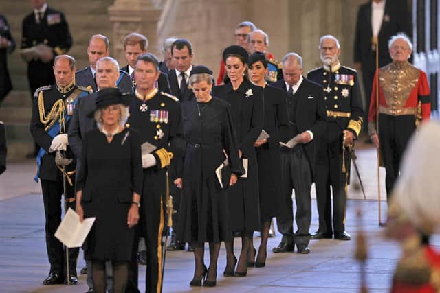 (left to right) the Earl of Wessex, the Prince of Wales, the Duke of York, the Queen Consort, the Duke of Sussex, Vice Admiral Sir Tim Laurence, Peter Phillips, the Countess of Wessex, the Princess of Wales, the Duchess of Sussex, the Earl of Snowdon and Prince Michael of Kent, behind the coffin of Queen Elizabeth II, draped in the Royal Standard with the Imperial State Crown placed on top, as it lays on the catafalque in Westminster Hall, London, where it will lie in state ahead of her funeral on Monday. Picture date: Wednesday September 14, 2022.